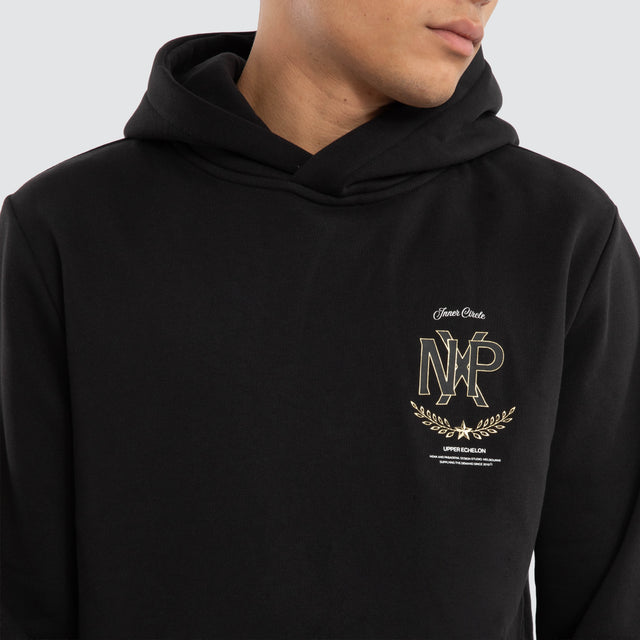 Model wears Ensemble Curved Hem Hoodie Jet Black Hoodies in Black - Image 3