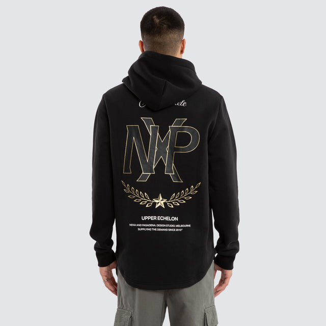 Model wears Ensemble Curved Hem Hoodie Jet Black Hoodies in Black - Image 2