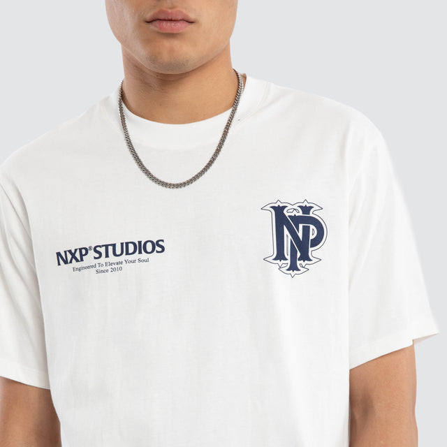 Model wears Drive Classic Tee Natural White T-Shirts in White - Image 3