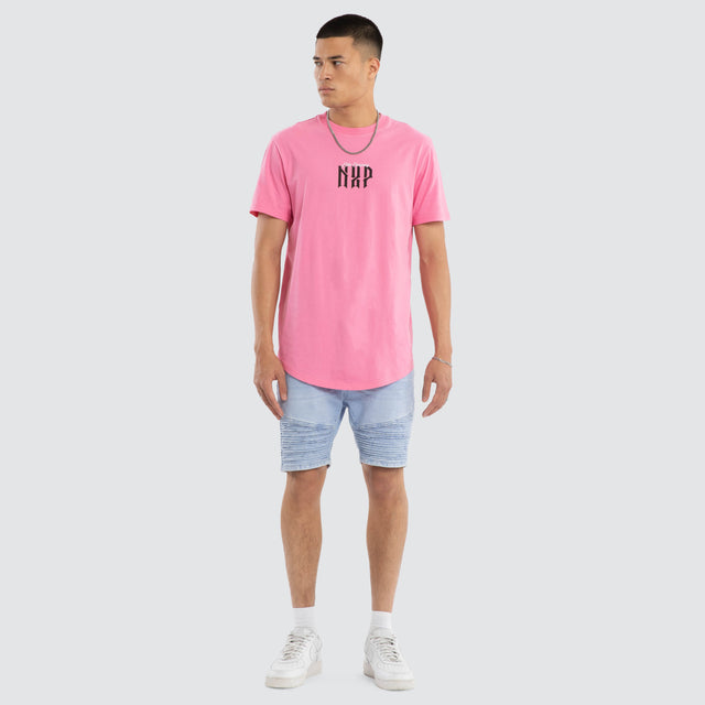 Model wears Ignite Curved Hem Tee Pink T-Shirts in Pink - Image 6