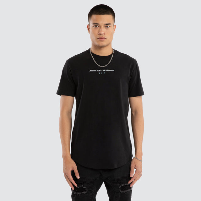 Model wears Inleash Curved Hem Tee Jet Black T-Shirts in Black - Image 1