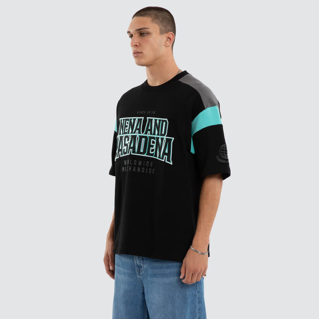 Model wears Conquer Loopback Raptor Tee Black/Turquoise T-Shirts in Black - Image 3