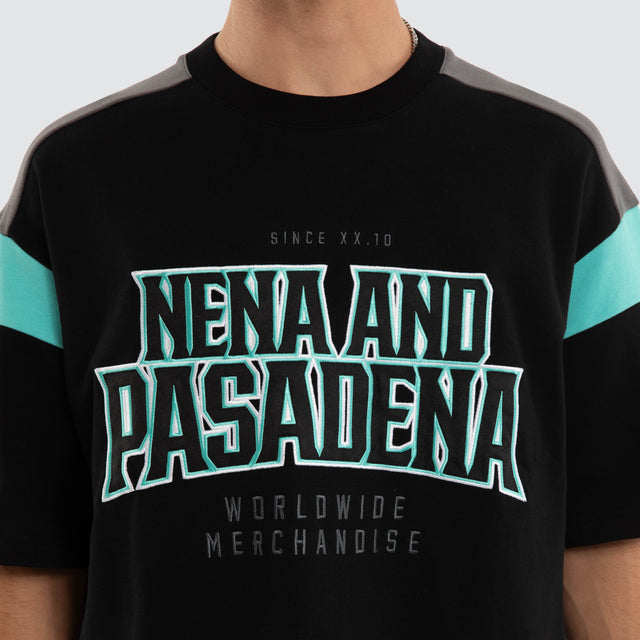 Model wears Conquer Loopback Raptor Tee Black/Turquoise T-Shirts in Black - Image 4