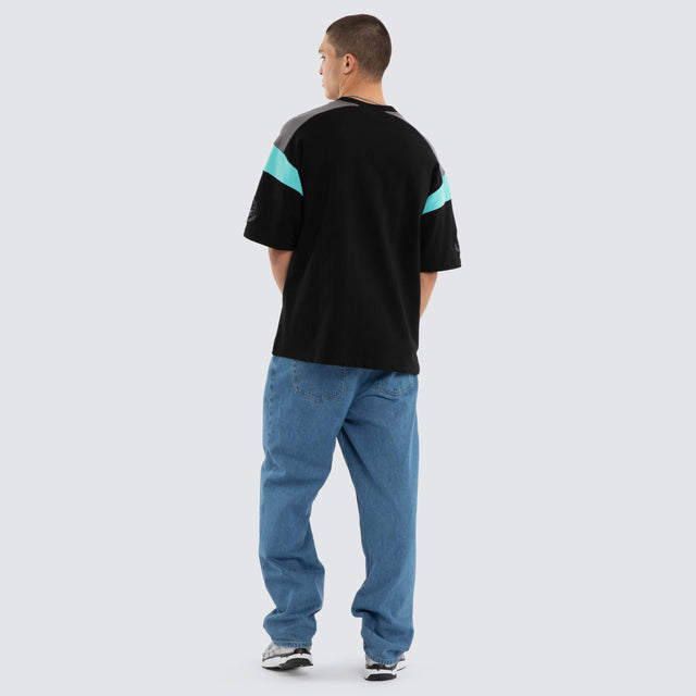 Model wears Conquer Loopback Raptor Tee Black/Turquoise T-Shirts in Black - Image 2