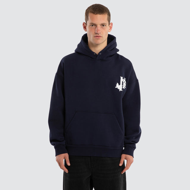 Model wears Fray Motion Box Fit Hoodie Black Iris Hoodies in Black - Image 1