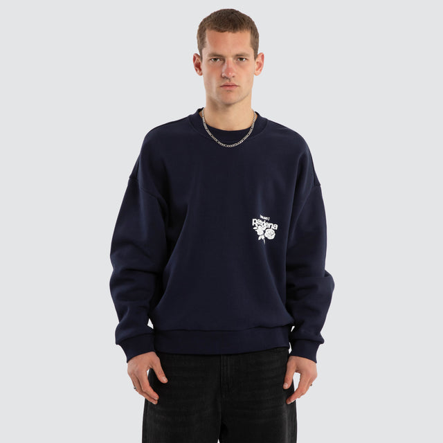 Model wears Fray Motion Box Fit Sweater Black Iris Jumpers in Black - Image 1