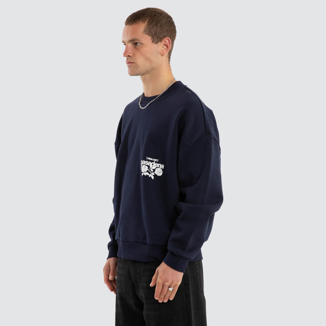 Model wears Fray Motion Box Fit Sweater Black Iris Jumpers in Black - Image 7
