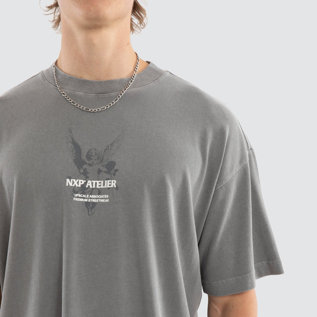 Model wears Pegasus Raptor Tee Pigment Frost Grey T-Shirts in Grey - Image 4