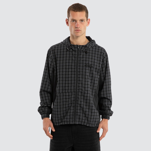 Model wears Chamber Spray Jacket Black Check Jackets in Black - Image 1