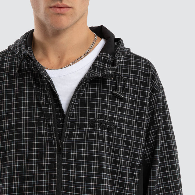 Model wears Chamber Spray Jacket Black Check Jackets in Black - Image 4