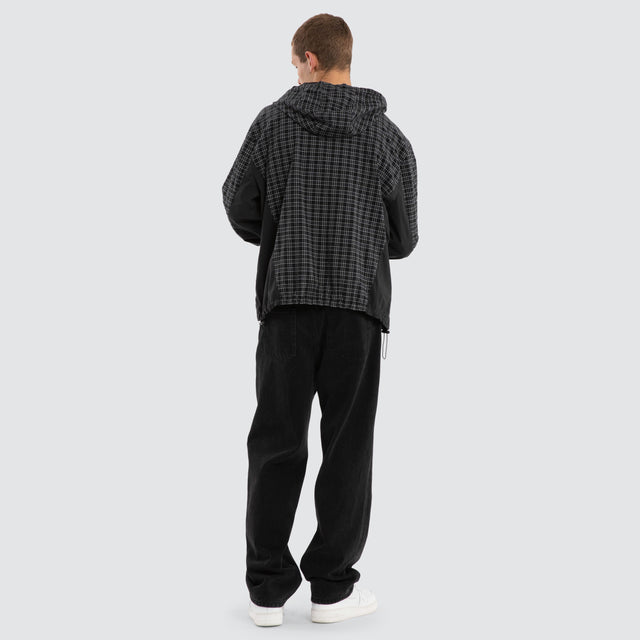 Model wears Chamber Spray Jacket Black Check Jackets in Black - Image 2