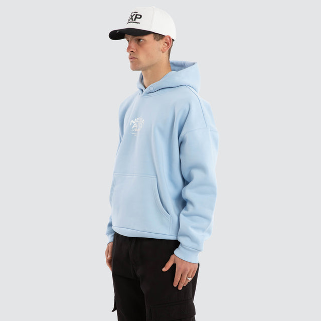 Model wears Eclipse Box Fit Hoodie Blue Bell Hoodies in Blue - Image 3