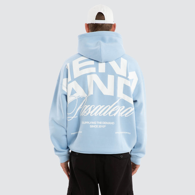 Model wears Eclipse Box Fit Hoodie Blue Bell Hoodies in Blue - Image 4