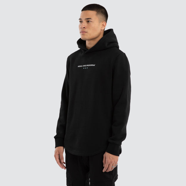 Model wears Unleash Curved Hem Hoodie Jet Black Hoodies in Black - Image 3