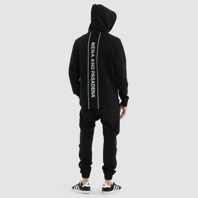 Model wears Unleash Curved Hem Hoodie Jet Black Hoodies in Black - Image 2