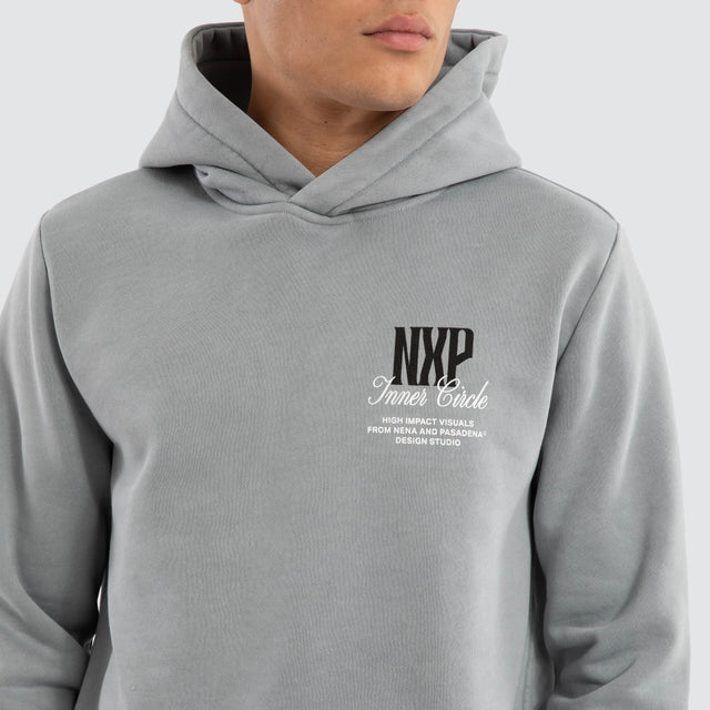 Model wears Dynamic Curved Hem Hoodie Pigment Grey Hoodies in Grey - Image 4