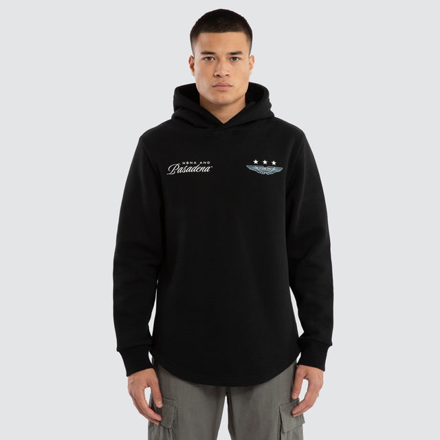 Model wears Break Curved Hem Hoodie Jet Black Hoodies in Black - Image 1