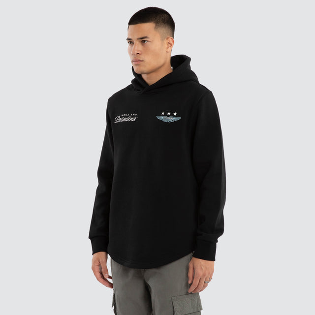 Model wears Break Curved Hem Hoodie Jet Black Hoodies in Black - Image 3