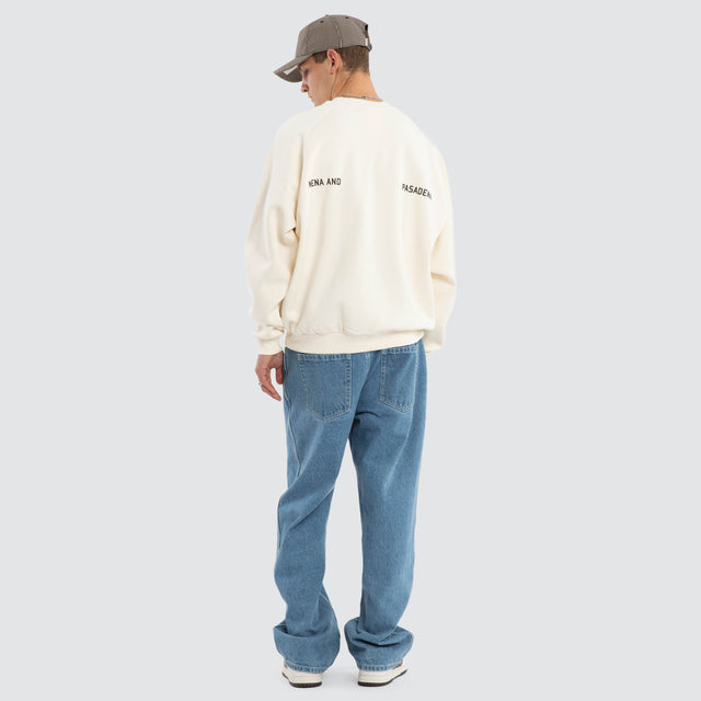 Model wears Rich Raglan Fleece Crew Warm White Gardenia Fleece in White - Image 2