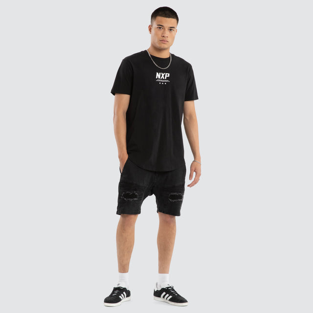 Model wears Synergy Curved Hem Tee Jet Black T-Shirts in Black - Image 2