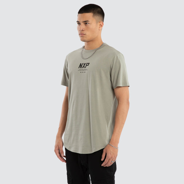 Model wears Synergy Curved Hem Tee in Grey T-Shirts in Grey - Image 4
