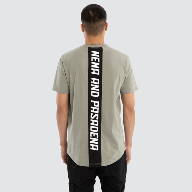 Model wears Synergy Curved Hem Tee in Grey T-Shirts in Grey - Image 1