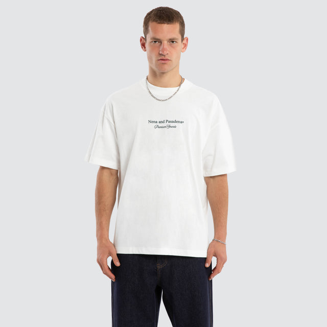 Model wears Audiophile Box Fit Tee Natural White T-Shirts in White - Image 1