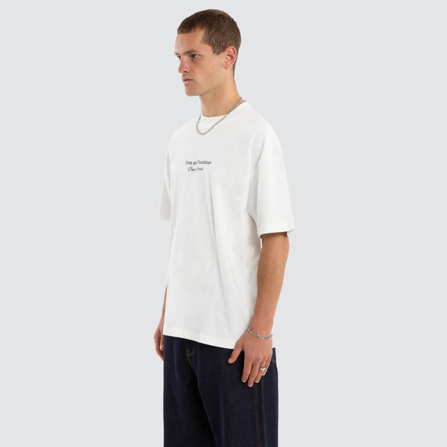 Model wears Audiophile Box Fit Tee Natural White T-Shirts in White - Image 3