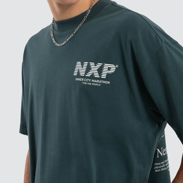 Model wears Marathon Raptor Tee Sea Moss T-Shirts in Green - Image 3