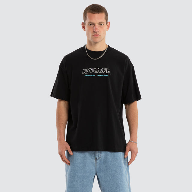 Model wears Airflow Box Fit Tee Anthracite Black T-Shirts in Black - Image 1