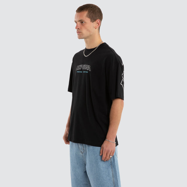 Model wears Airflow Box Fit Tee Anthracite Black T-Shirts in Black - Image 3