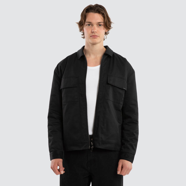 Model wears Frame Jacket Black Jackets in Black - Image 1