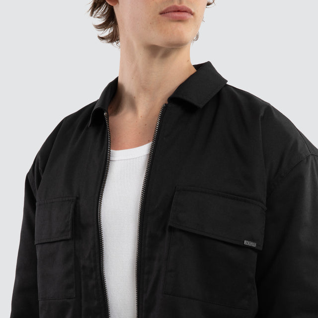 Model wears Frame Jacket Black Jackets in Black - Image 2