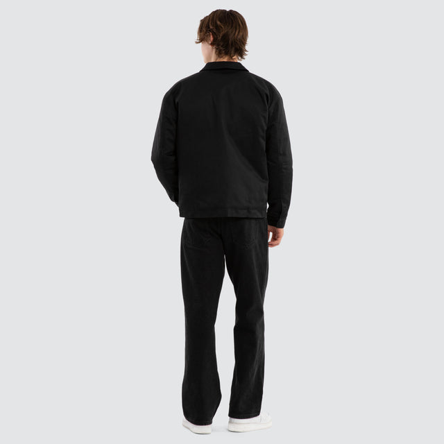 Model wears Frame Jacket Black Jackets in Black - Image 4