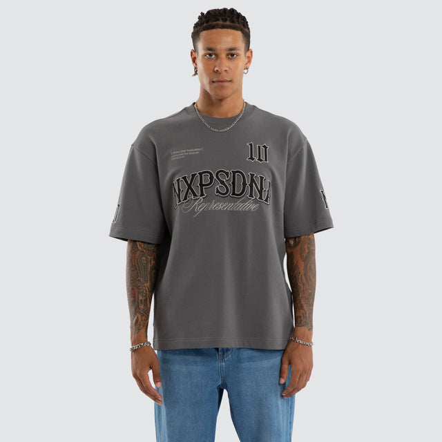 Model wears Warrior Cotton Loopback Oversized Tee in Grey T-Shirts in Grey - Image 1