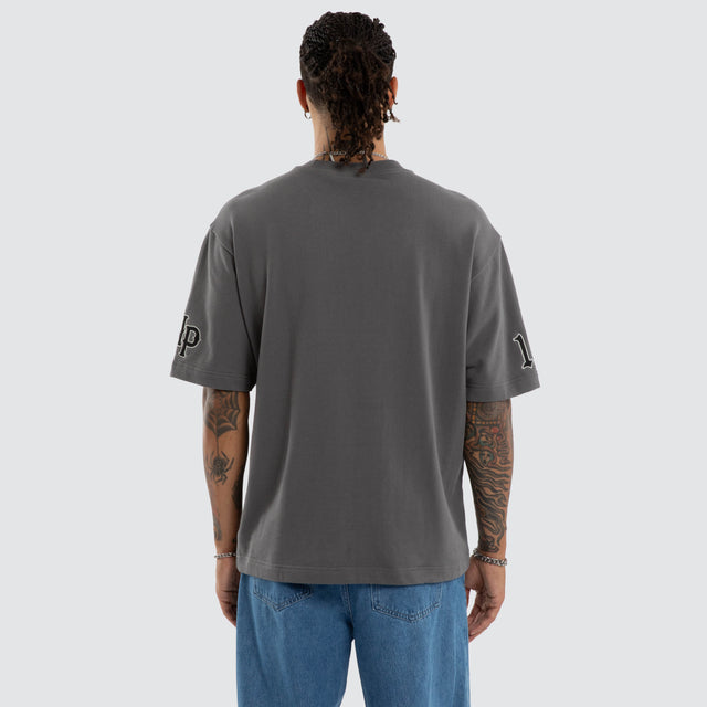 Model wears Warrior Cotton Loopback Oversized Tee in Grey T-Shirts in Grey - Image 4