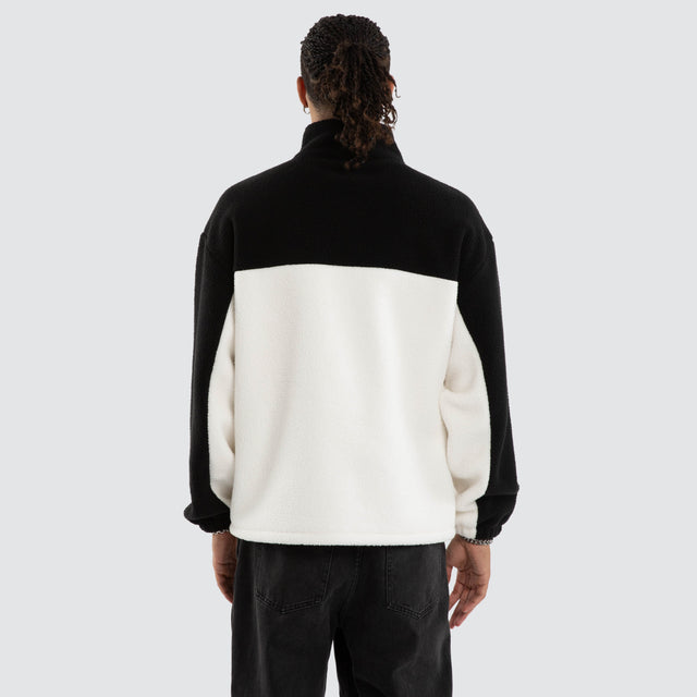 Model wears Slick Pullover Black/White Pullover in Black - Image 6