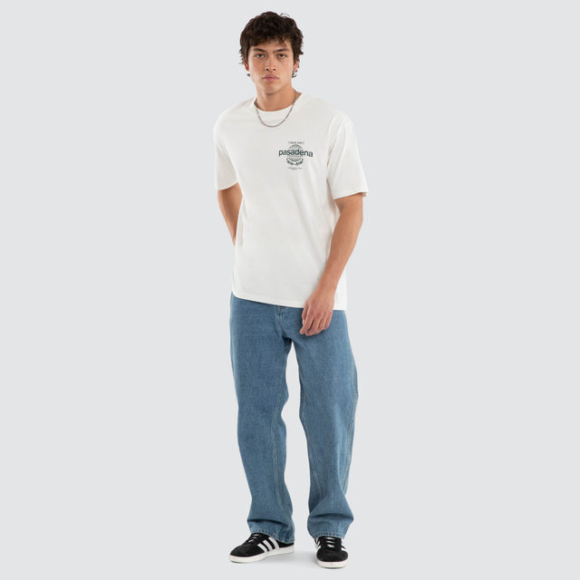 Model wears Dreams Box Fit Tee White  T-Shirts in White - Image 5