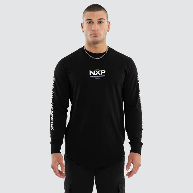 Model wears Peak Curved Hem Longsleeve Tee Black Longsleeve T-Shirts in Black - Image 2
