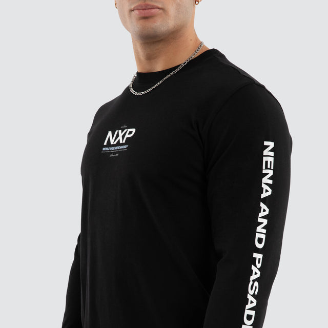 Model wears Peak Curved Hem Longsleeve Tee Black Longsleeve T-Shirts in Black - Image 3