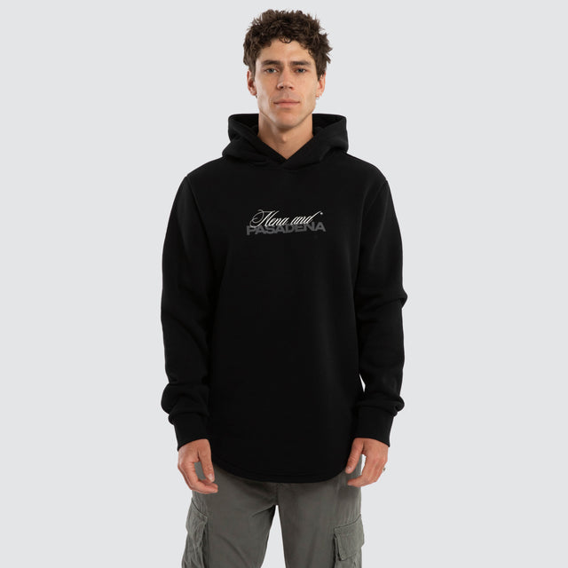 Model wears Umbran Dual Curved Hoodie Jet Black Hoodies Black – image 1