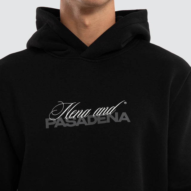 Model wears Umbran Dual Curved Hoodie Jet Black Hoodies Black – image 3