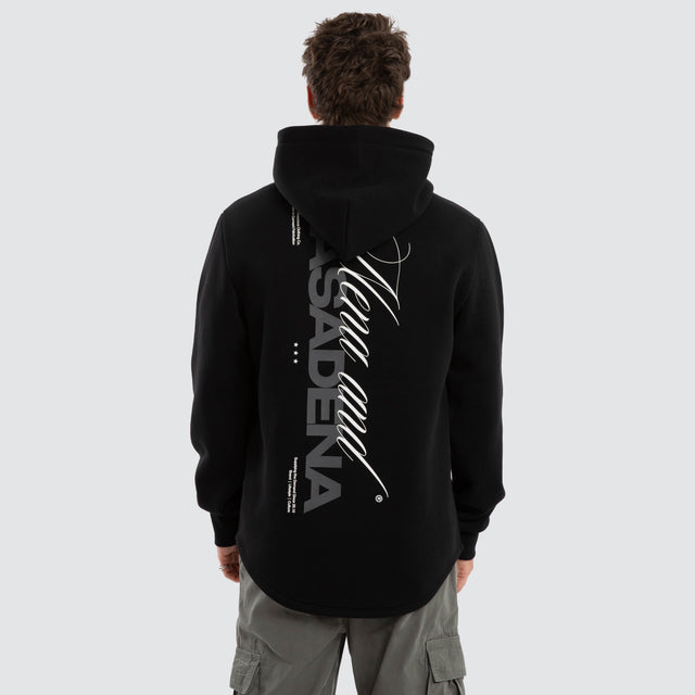 Model wears Umbran Dual Curved Hoodie Jet Black Hoodies Black – image 2