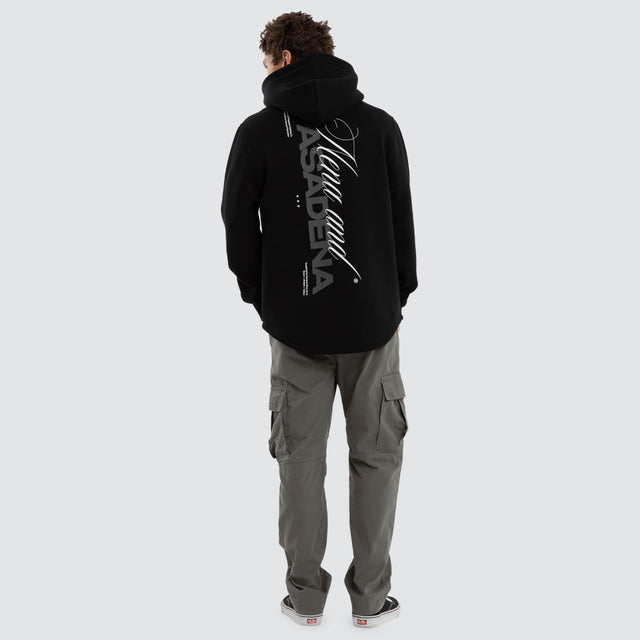 Model wears Umbran Dual Curved Hoodie Jet Black Hoodies Black – image 4