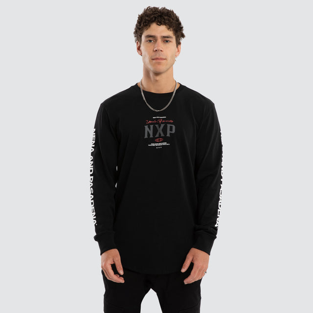 Model wears Nexus Dual Curved Longsleeve Tee Jet Black Longsleeve T-Shirts Black – image 1