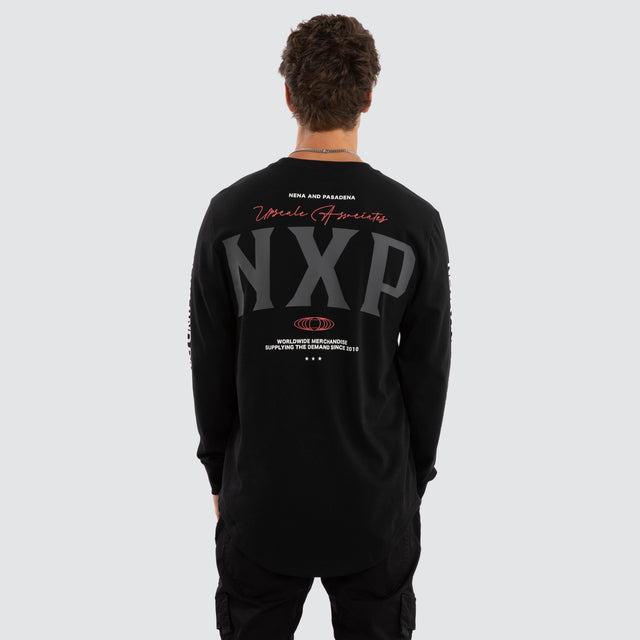 Model wears Nexus Dual Curved Longsleeve Tee Jet Black Longsleeve T-Shirts Black – image 3