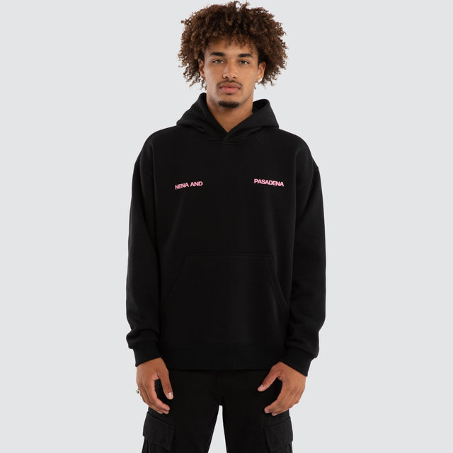 Model wears Neonix Relaxed Fit Hoodie Jet Black Hoodies Black – image 2