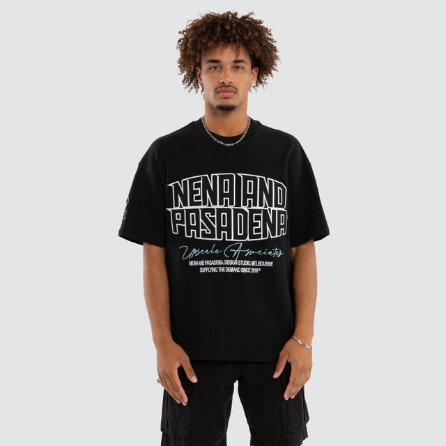 Model wears Ashlon Loopback Raptor Tee Anthracite Black T-Shirts Black – image 1