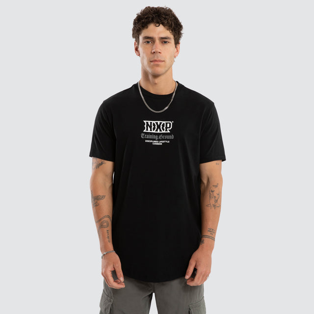 Model wears Koralyx Dual Curved Tee Jet Black T-Shirts Black – image 1
