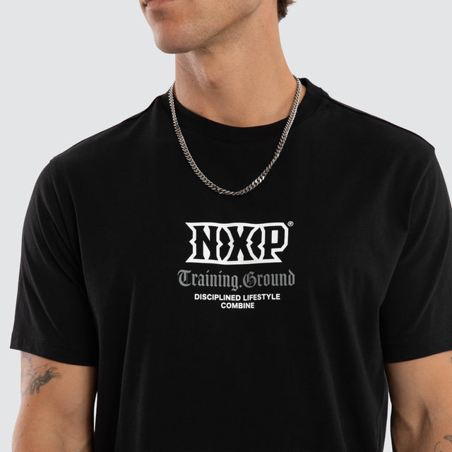 Model wears Koralyx Dual Curved Tee Jet Black T-Shirts Black – image 3